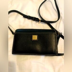 Full grain leather Dooney & Bourke crossbody black bag.